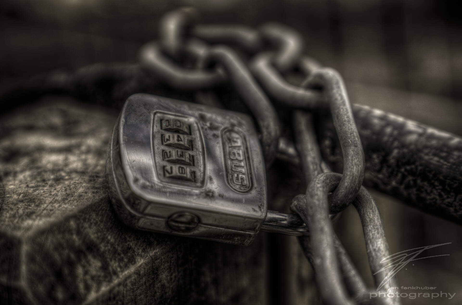 0438 - Locked A chain locked with a numerical padlock