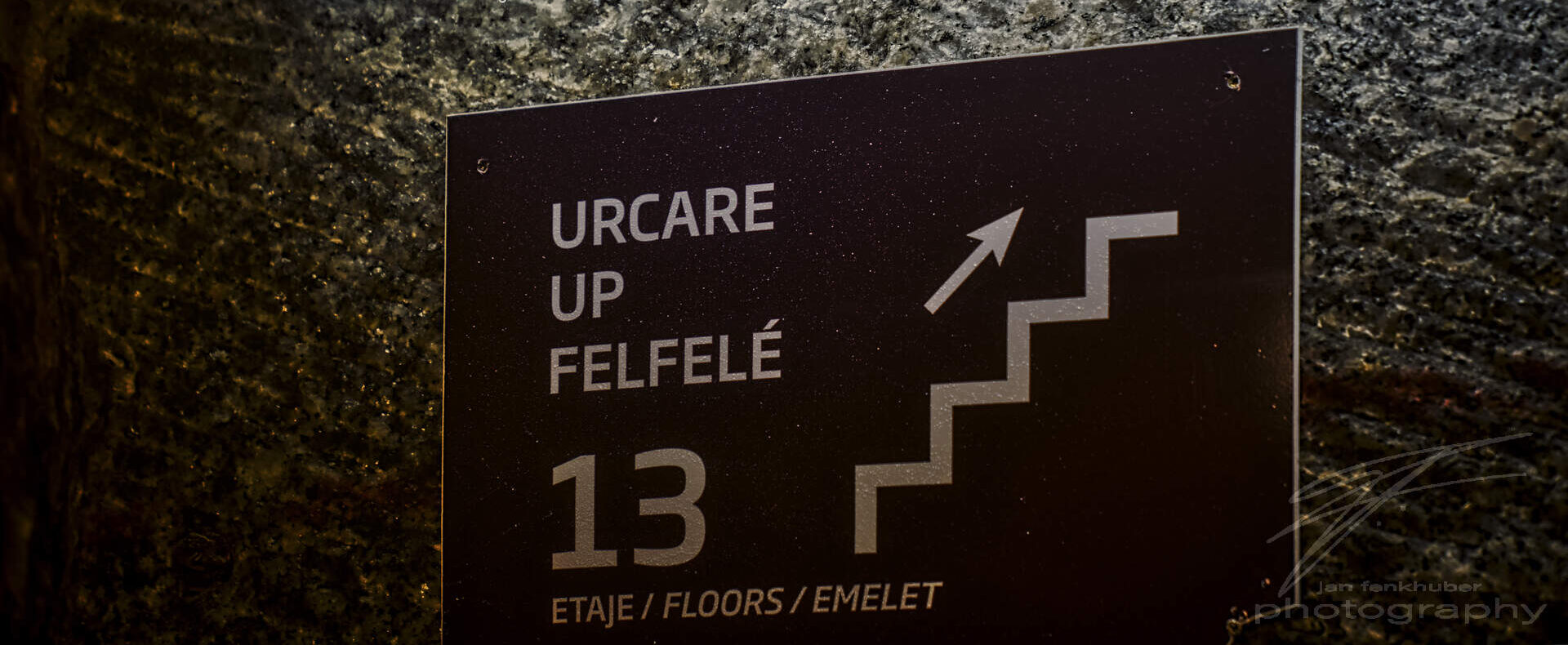 13th Floor A sign in the Salina Turda, a salt mine in Romania.