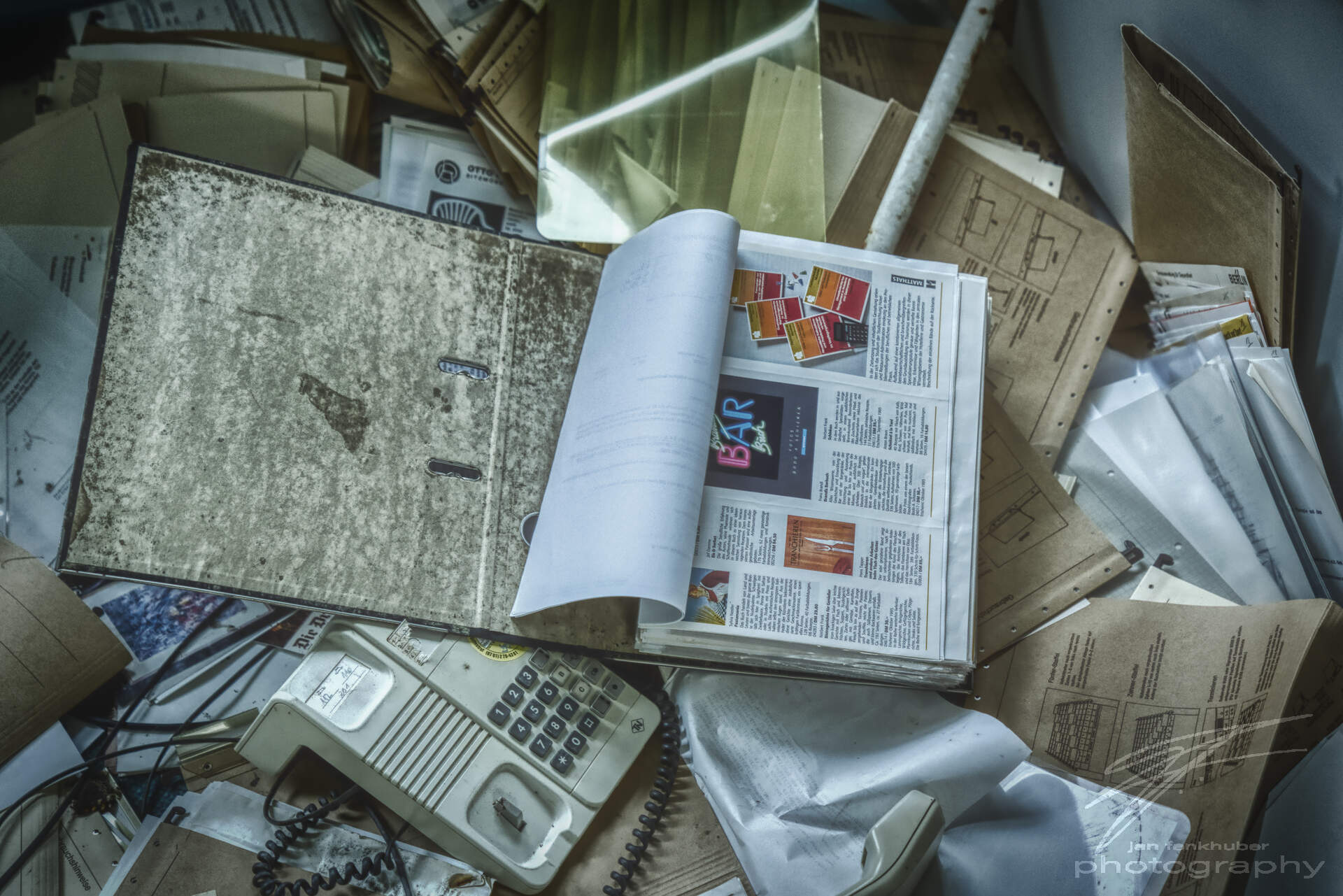 Old files and folders in an abandoned wellness clinic in Germany.