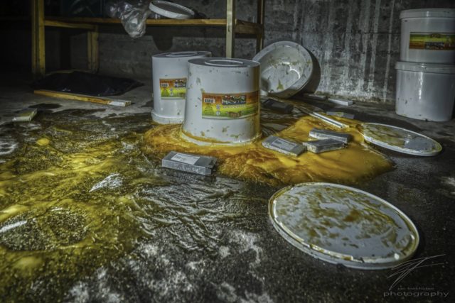 Spilled - Buckets of mayonnaise spilled in the basement of an abandoned Jewish Talmud school in Switzerland, Schweiz