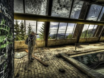 Under broken Windows - Frank taking a picture of the pool in the Clinique du Diable, an abandoned Clinic, Sanatorium, Hotel in Alsace, France