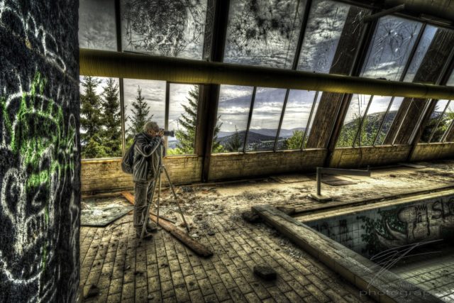 Under broken Windows - Frank taking a picture of the pool in the Clinique du Diable, an abandoned Clinic, Sanatorium, Hotel in Alsace, France
