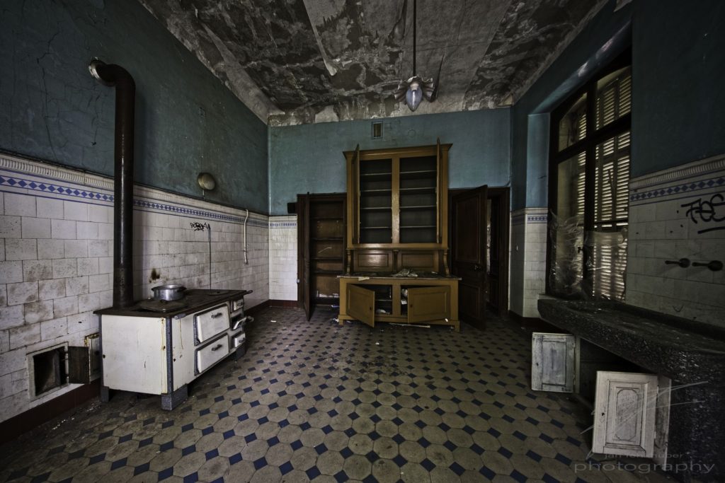 In the Kitchen - The kitchen of the Château Lumière, an abandoned villa / mansion in Alsace, France